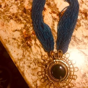 Vintage well kept beaded necklace made in India